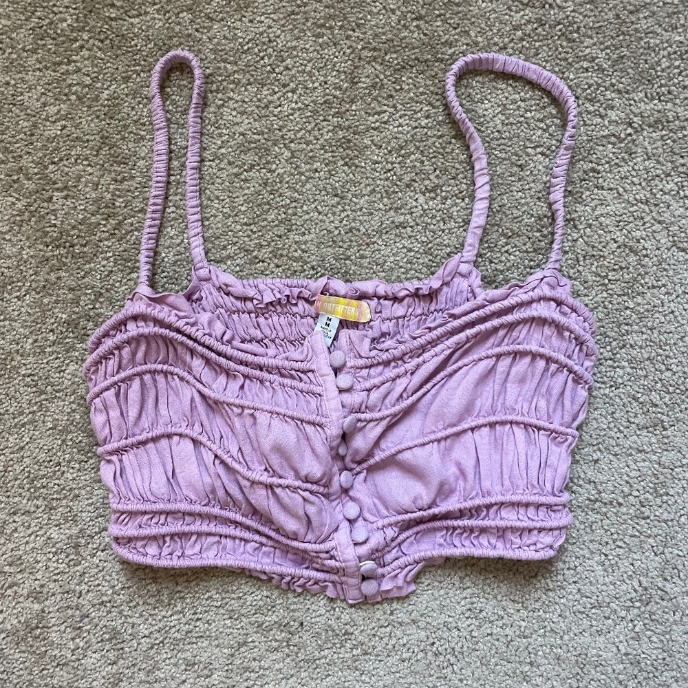 Two tops in purple and brown. Fit is more like a small